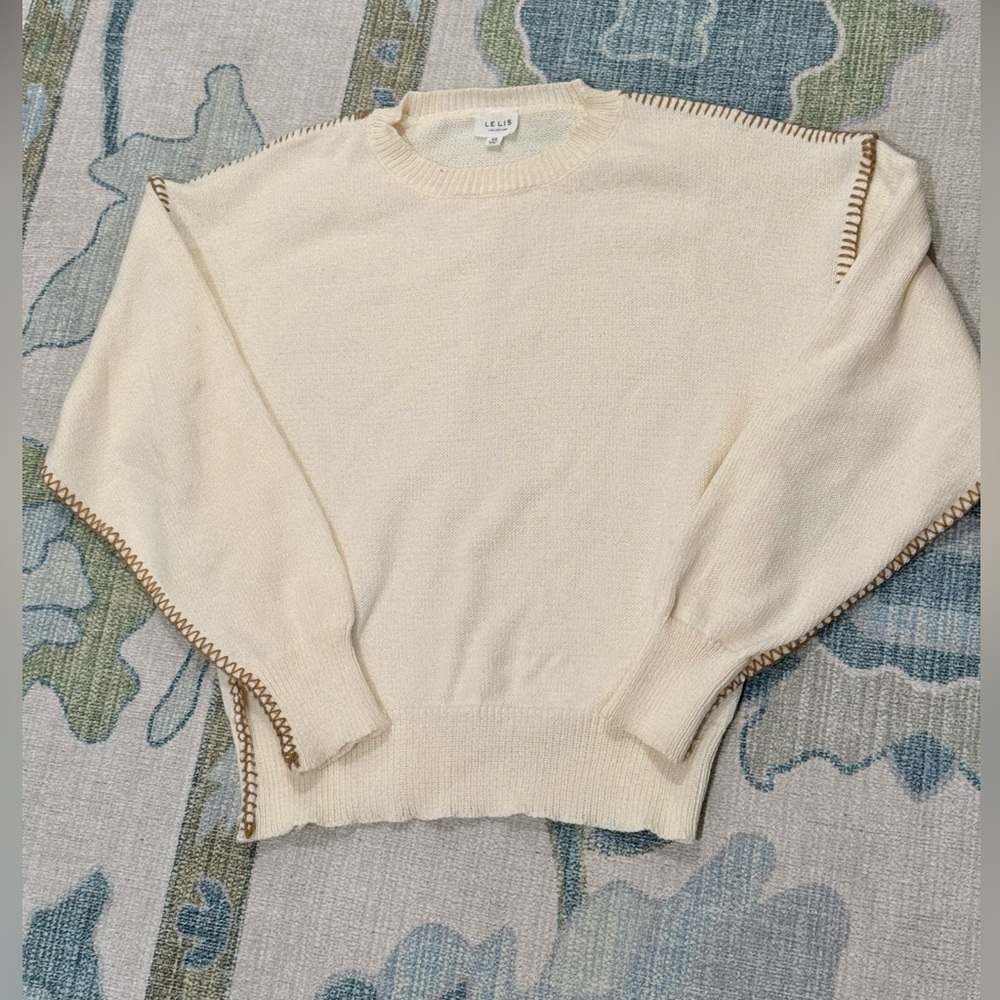 These three boutique sweater
